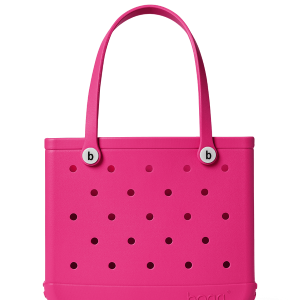 Pink tote bag with black polka dots and 'b' logo on a white background