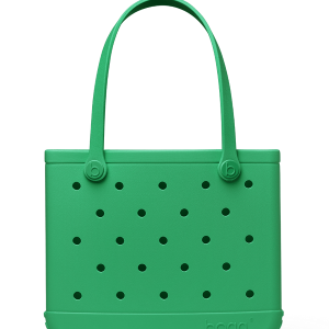 Green handbag with perforated design on a white background