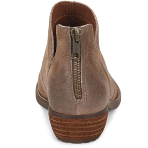 Brown ankle boot with a zipper on a white background