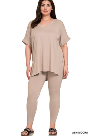 Woman wearing an ash mocha outfit on a white background