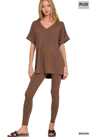 Woman wearing a brown outfit on a white background