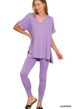 Woman wearing a lavender outfit on a white background