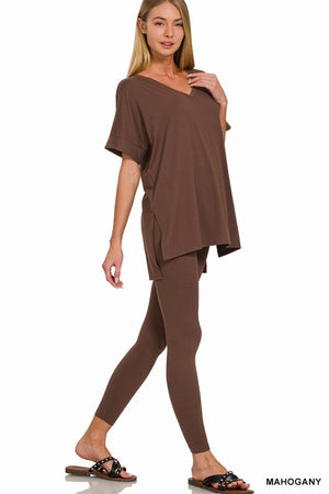 Woman wearing a brown outfit on a white background