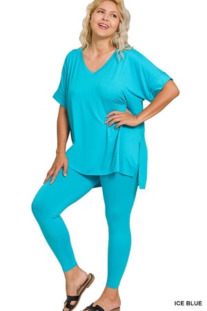Woman wearing a turquoise outfit on a white background