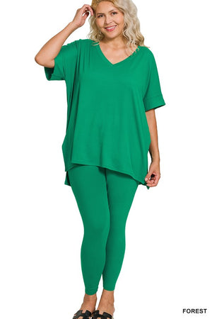 Woman wearing a green outfit on a white background