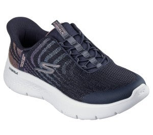 Navy blue athletic shoe with white sole on a white background
