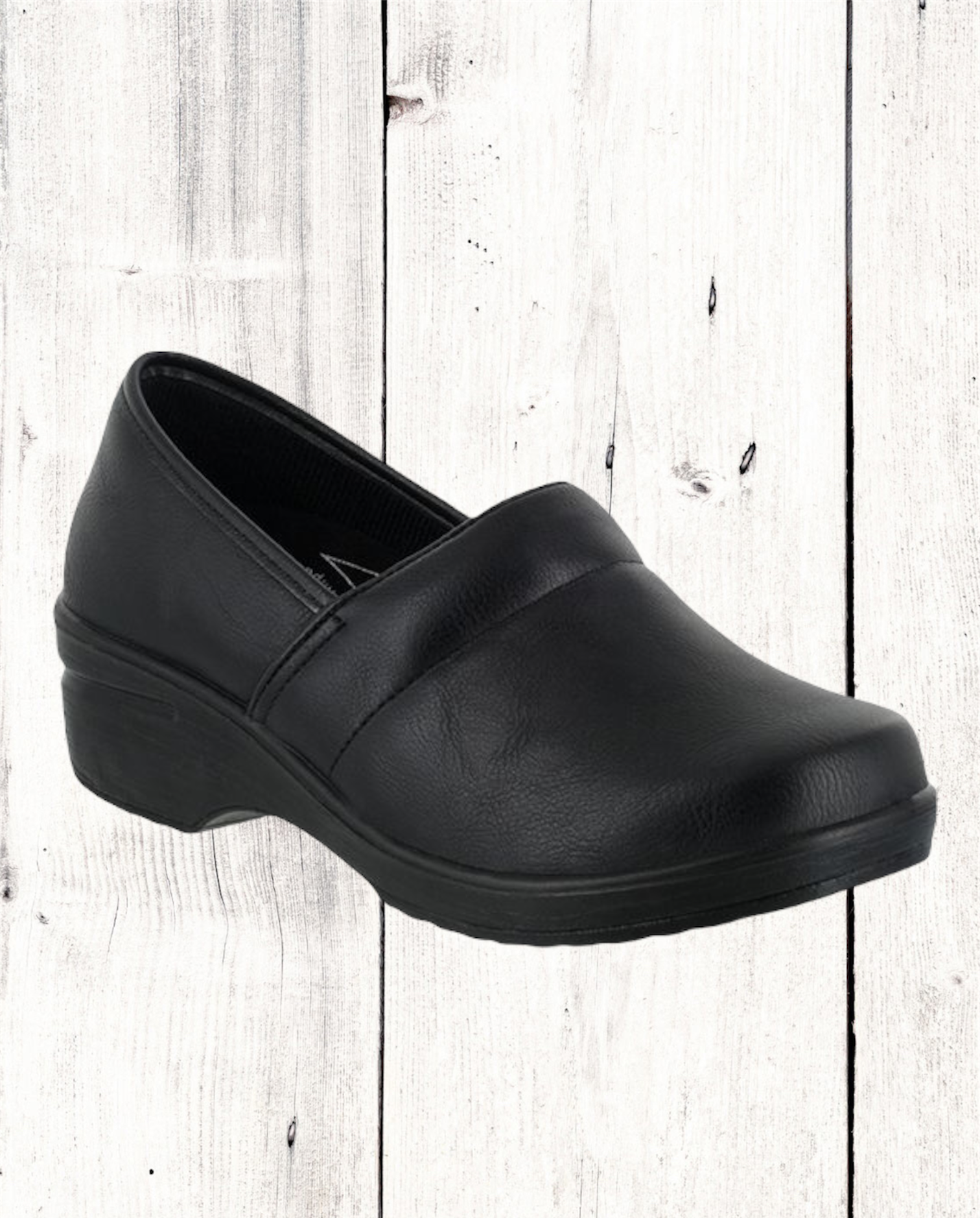 A black work clog shoe with a slip-resistant rubber outsole, designed by Easy Street.