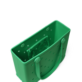 Green plastic tool holder with multiple compartments on a white background