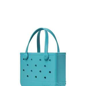 Turquoise handbag with handles on a white background