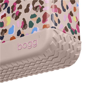 Close-up of a colorful patterned shoe with 'bogg' branding on a white background