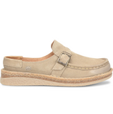 Beige loafer shoe with a buckle on a white background