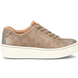 Brown suede sneaker with white sole on a white background
