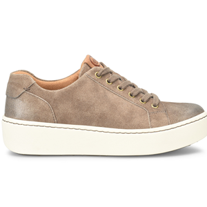 Brown suede sneaker with white sole on a white background