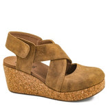 Tan wedge sandal with cork sole on a white background