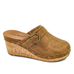 Brown clog shoe with a cork wedge sole on a white background