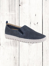 A navy perforated sneaker with a lightweight white sole, featuring twin gores for fit.