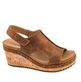 Brown wedge sandal with cork sole on a white background