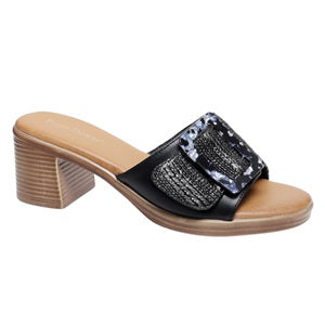 Black slide sandal with a patterned strap on a white background