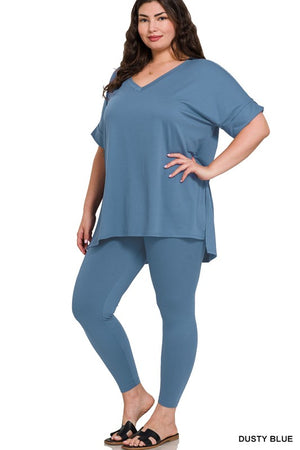 Woman wearing a blue outfit with 'Dusty Blue' text on a white background