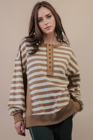 Women's brown and beige striped, button down shirt.