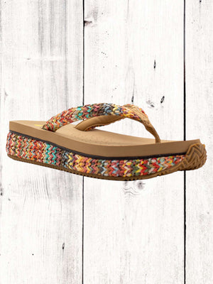 A pair of beige flip flops with a woven raffia upper and a low platform sole.