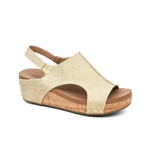 Beige sandal with wooden sole on a white background