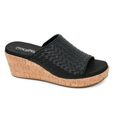 Black wedge sandal with woven design on a white background