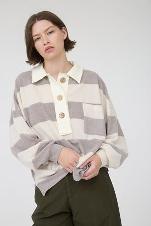 Person wearing a checkered shirt with a white background