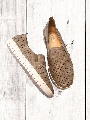 A pair of black Easy Street brand sneakers with a flexible outsole, featuring a perfed upper with twin gores for stretch fit, and an insole with a light-colored footbed.